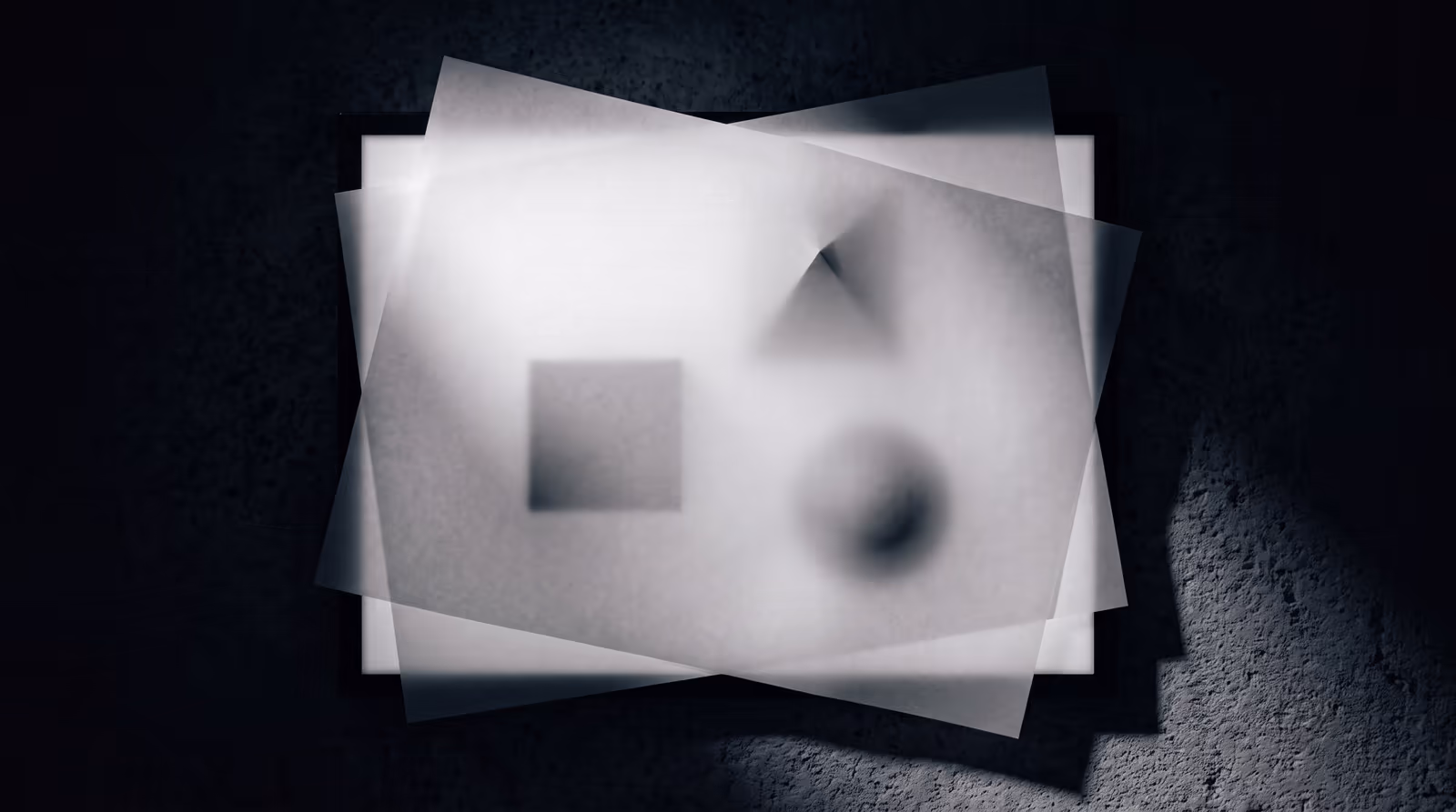Sheets of tracing paper overlapping on a light table
